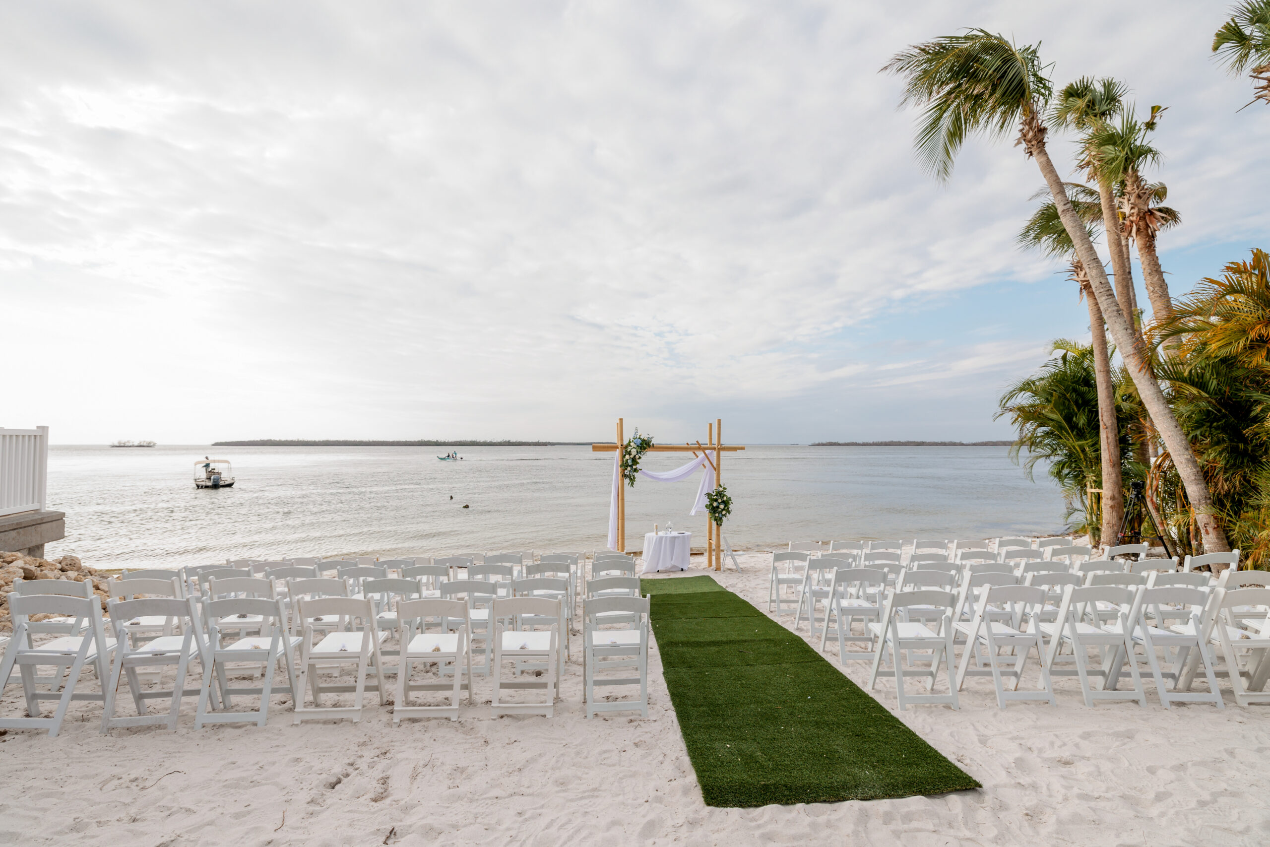 outdoor wedding ceremony by the beach at Marriott Sanibel Harbour Resort and Spa