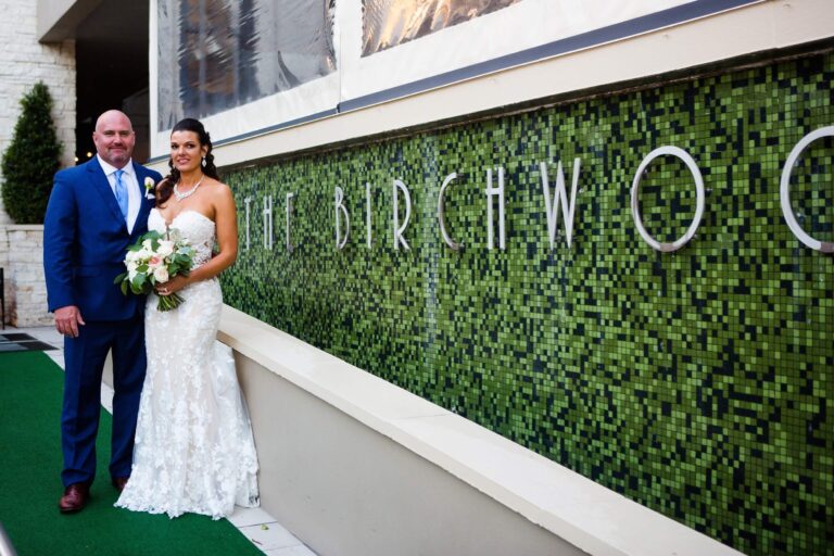 bride and groom outside The Birchwood