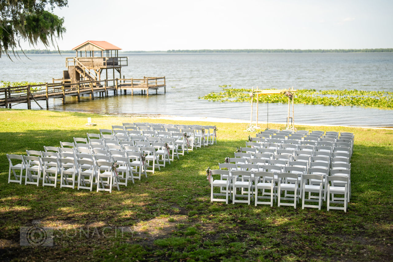outdoor wedding ceremony by the water at Bella Cosa