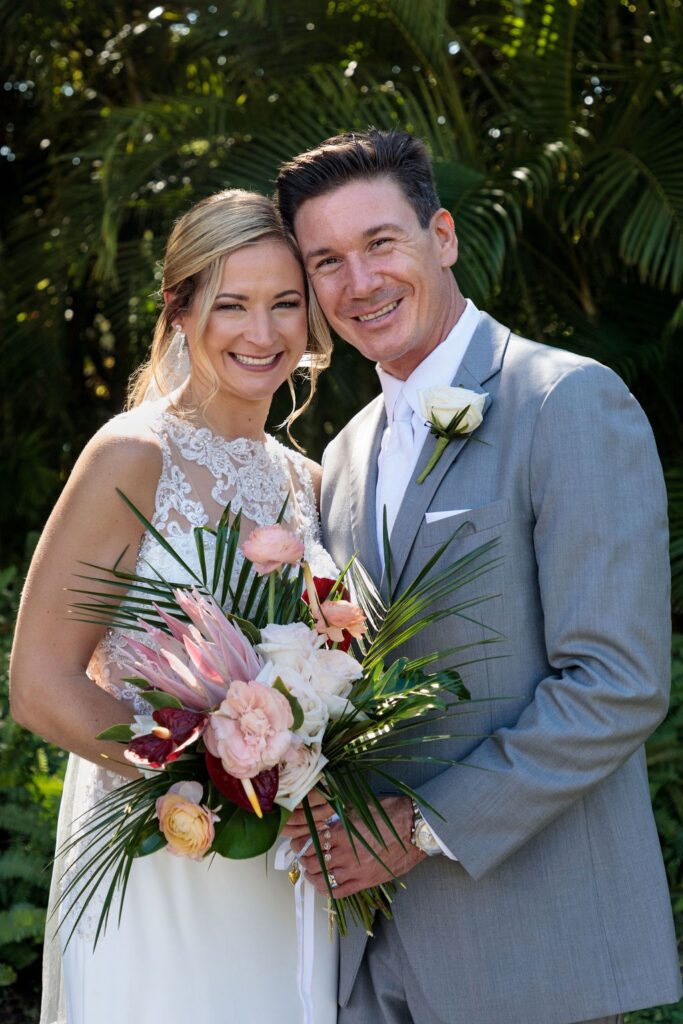 bride with wildflower and palm leaf bridal bouquet 