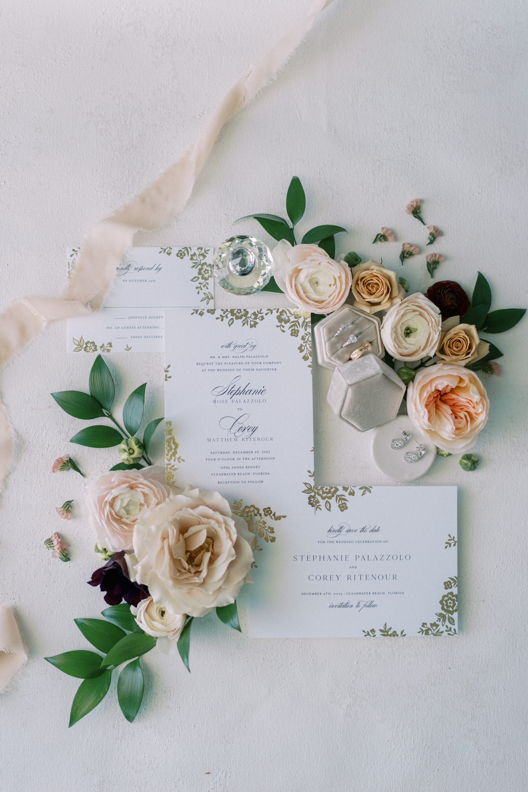 elegant floral wedding invitation flatlay
