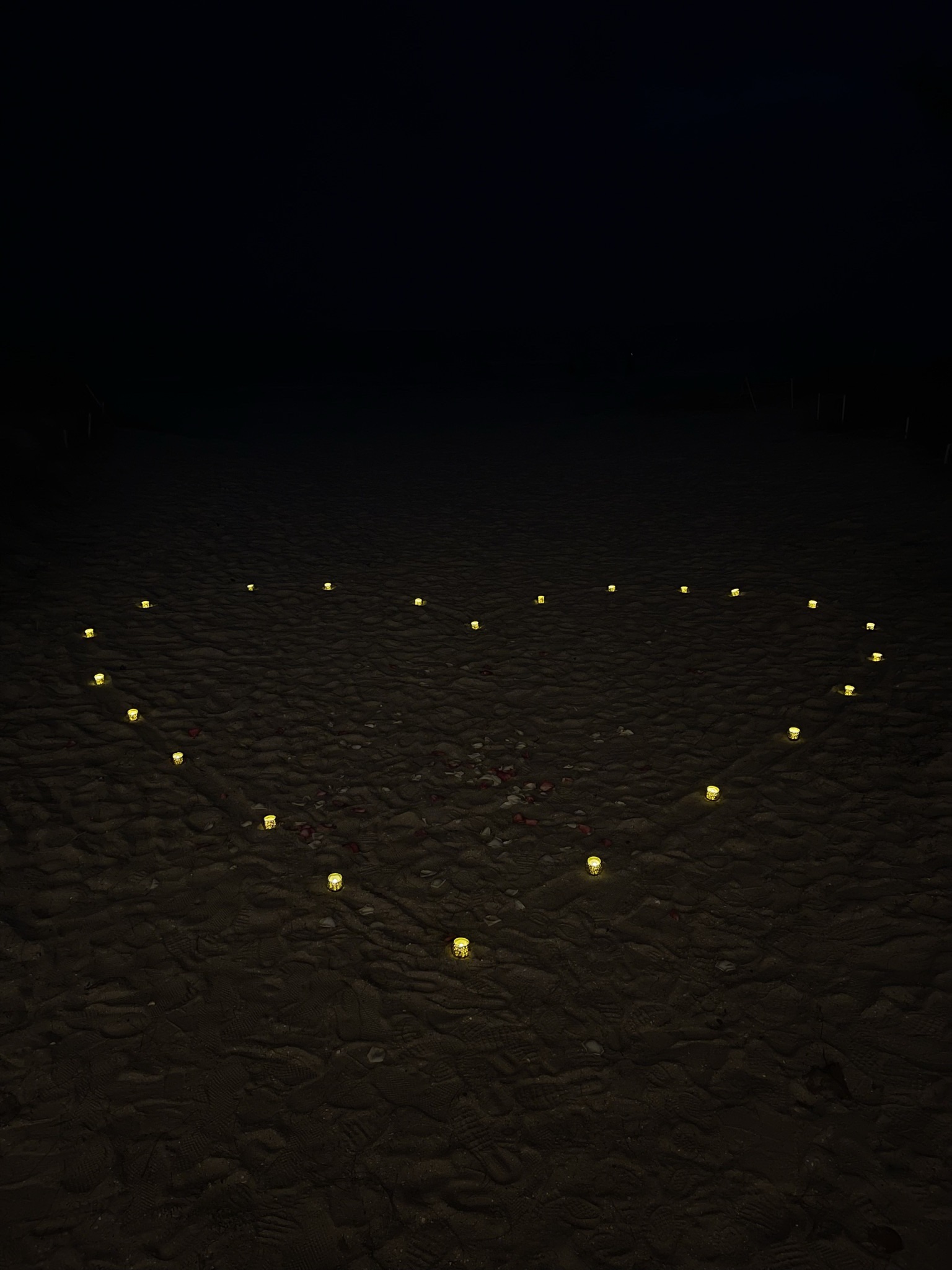 candle heart on the beach at Treasure Island