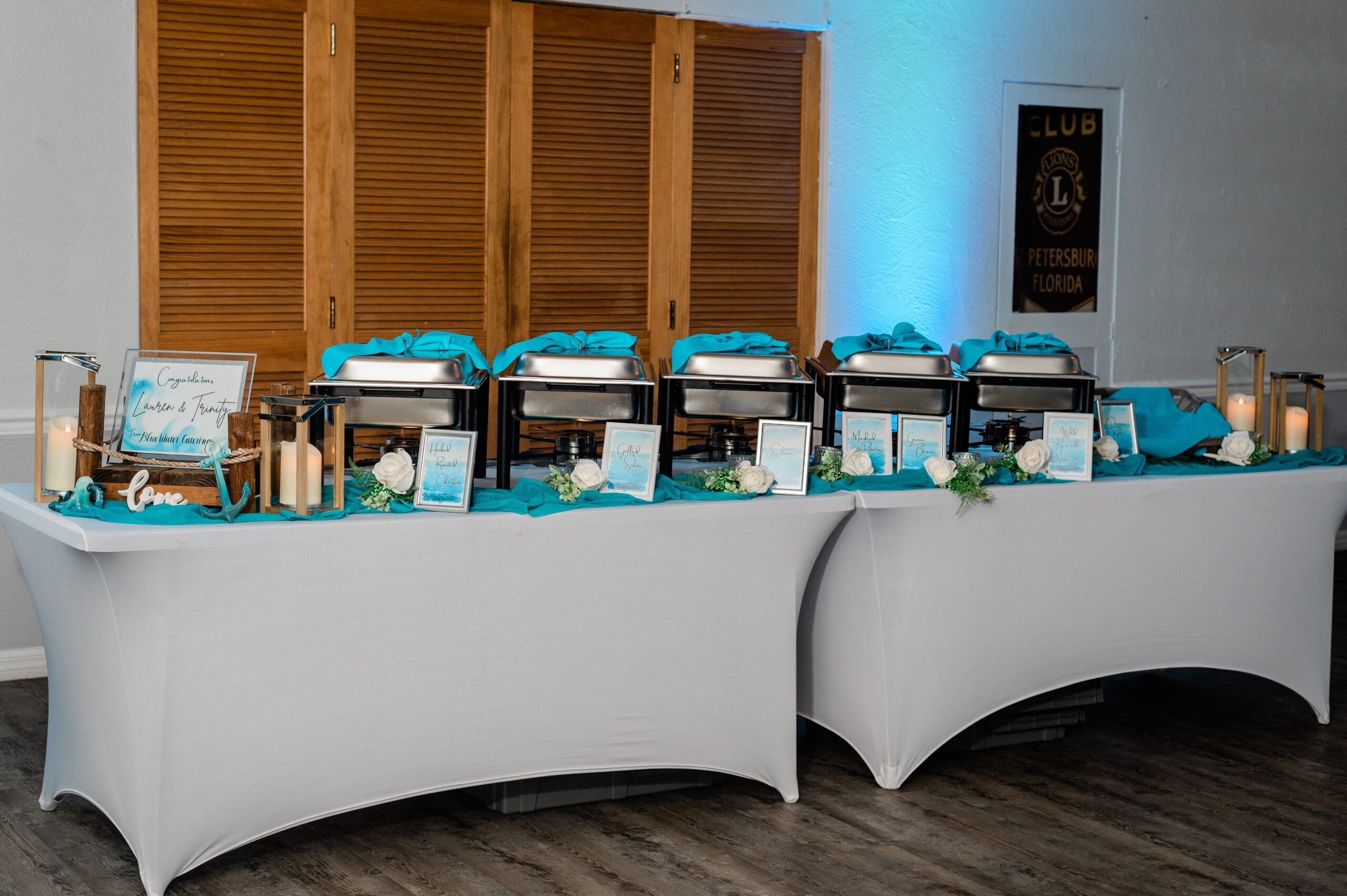 wedding buffet decorated with blue at Lion's Club Treasure Island