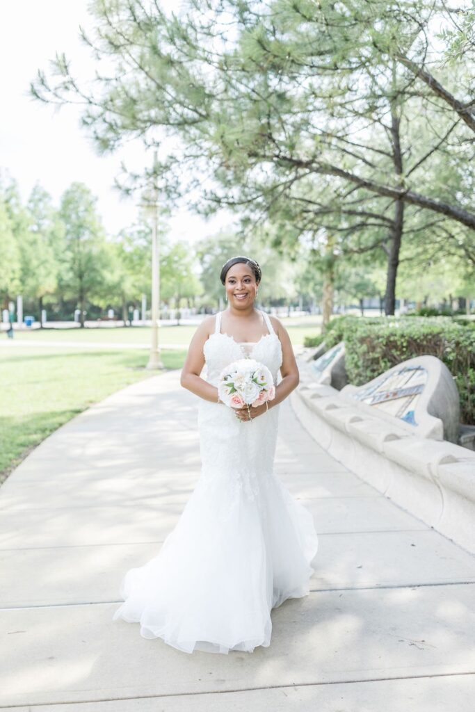 bride in embroidered tulle fit and flare gown